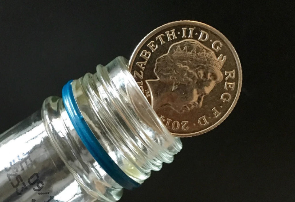 Coin in the Bottle 10 pence Folding Coin 10p Magic Trick  Close up Magic - Made with Real 10p Coin