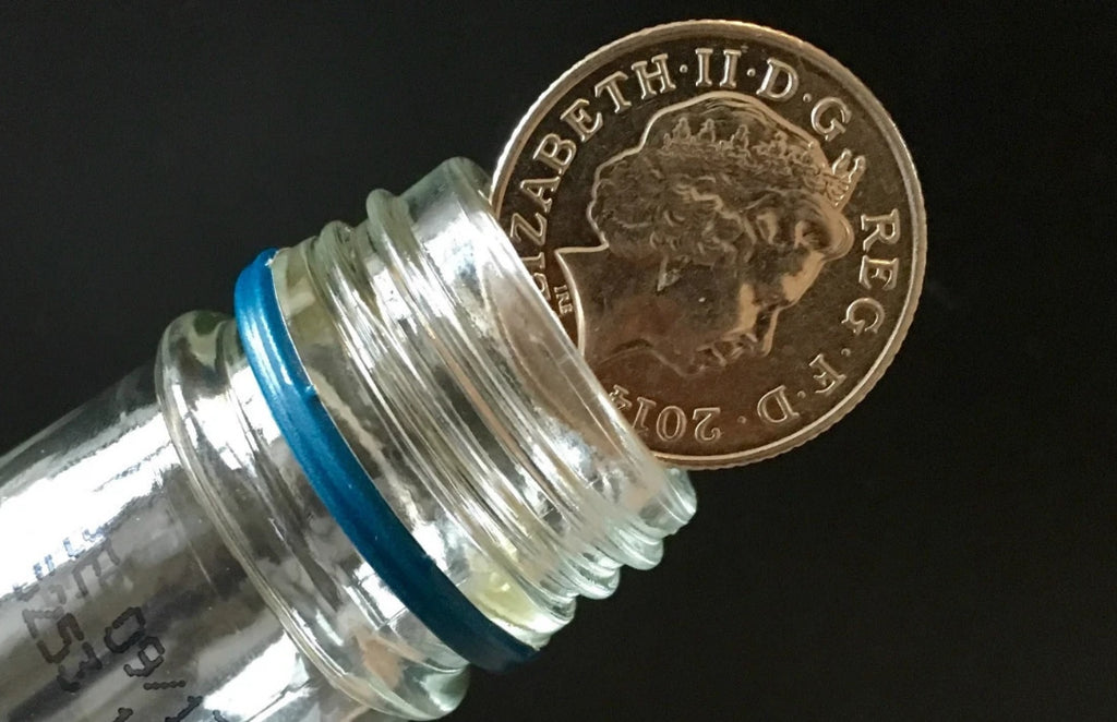 Coin in the Bottle 10 pence Folding Coin 10p Magic Trick  Close up Magic - Made with Real 10p Coin