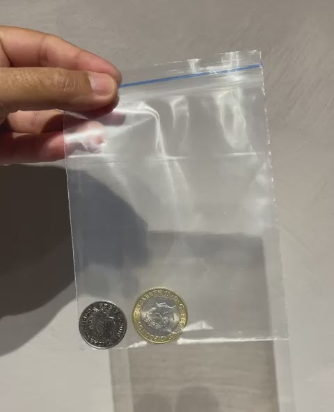 Split Coin Magic - 10p Split Coin Magic Trick -  Coin Thru Bag